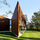 Illustration for article titled This Modern Home Frames the Winery Around It With Weathered Steel